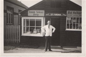 Photo:Dave Foreman outside The Stores 1958, with the old WI hall on the left