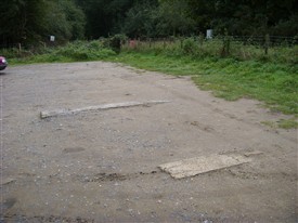 Photo:Foundations visible in car park in 2008 off Cades Road
